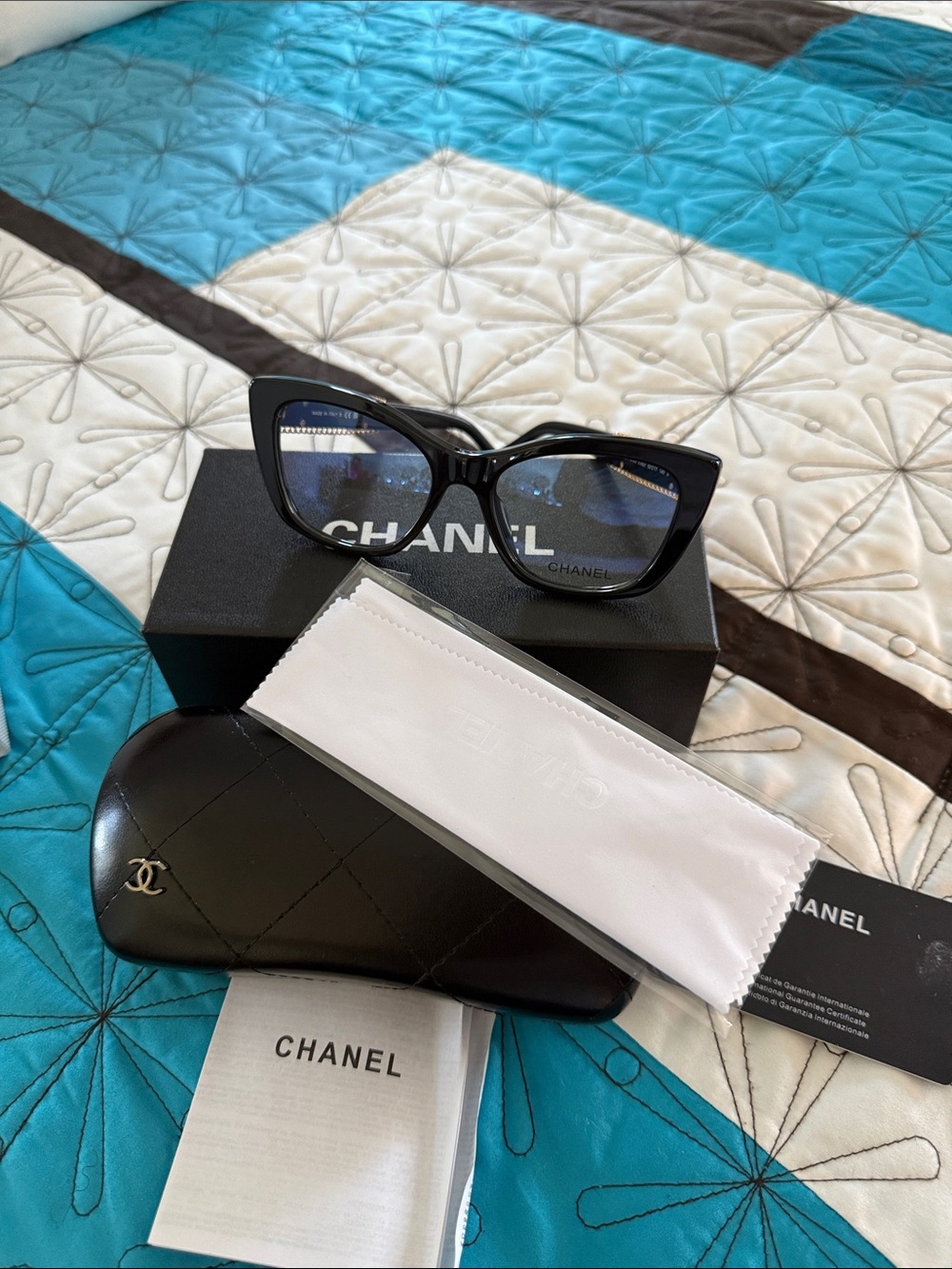 CHANEL Black Cat-Eye Sunglasses with Quilted Case
